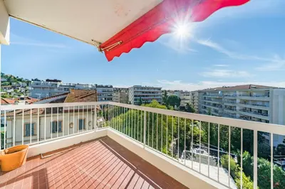 a balcony with a view of a city at Brand new 2 bedrooms heart of Cannes in Cannes