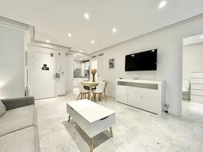 a living room with a couch and a table at Cannes one bedroom apartment - 8D1 in Cannes
