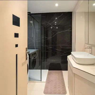 a bathroom with a shower and a sink at Appartement rue D'antibes in Cannes