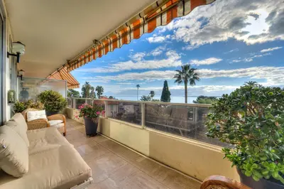 a balcony with a view of the ocean at La Rose des Vents - Cannes in Cannes