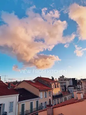 a view of a city with a cloudy sky at 2 Bedrooms Apartment-Cannes Center Suquet-2mins to Beach & 10mins to Palais-AirConditioning & FiberWifi in Cannes