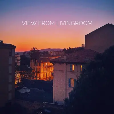 a view from living room of a city at sunset at 2 Bedrooms Apartment-Cannes Center Suquet-2mins to Beach & 10mins to Palais-AirConditioning & FiberWifi in Cannes