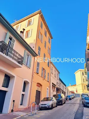a street with cars parked on the side of a building at 2 Bedrooms Apartment-Cannes Center Suquet-2mins to Beach & 10mins to Palais-AirConditioning & FiberWifi in Cannes