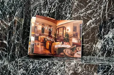 a picture of a living room in a book at Sable Croisette - Appartement de Luxe avec terrasse et vue Mer in Cannes