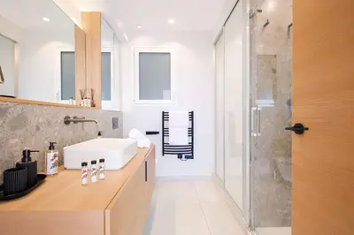 a bathroom with a sink and a shower at Prestige Croisette - Apartment with Panoramic Terrace and Sea View in Cannes in Cannes
