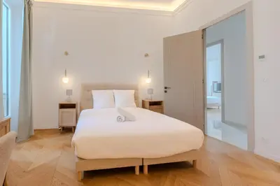 a bathroom with a sink and a shower at Cannes Centre - Palais a pied - Appartement Prestige 3 chambres et studio - 8 pers in Cannes