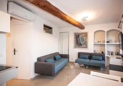 a living room with two chairs and a couch at Cannes Marina by Connexion in Cannes