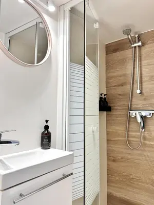 a bathroom with a sink and a mirror at Croisette Studio 1 min beach in Cannes