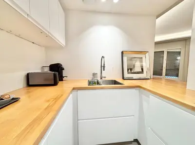 a kitchen counter with a sink and a microwave at Cannes 2x2 bedrooms apartment - 24P3 in Cannes
