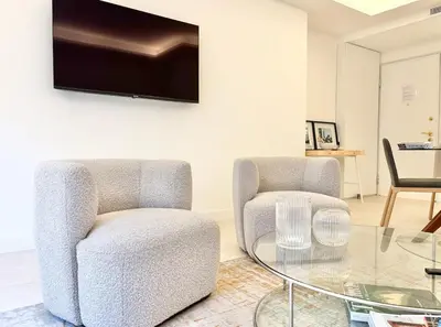a living room with two chairs and a glass table at Cannes 2x2 bedrooms apartment - 24P3 in Cannes