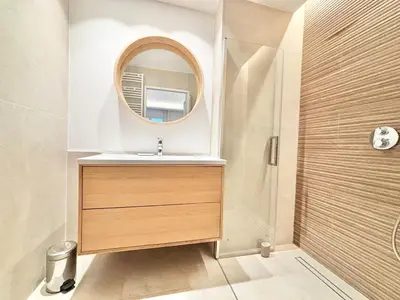a bathroom with a sink and a mirror at Cannes 2x2 bedrooms apartment - 24P3 in Cannes