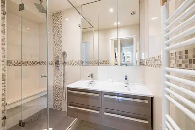 a bathroom with a sink and a shower at Splendid apartment a-c 2BR-4P - Sea View in Cannes