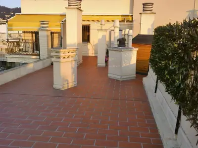 a brick walkway in front of a building at Apartment Boite d'Amour Wohnung mit Terrasse und Solarium by Interhome in Cannes