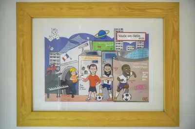 a framed picture of a group of people in a city at 6Bedroom Duplex with Sauna, AC Wi-Fi Central Cannes in Cannes