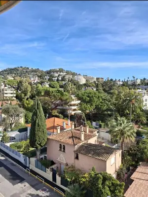 a view of a city with houses and trees at Appartement Ima in Cannes