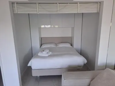 a bedroom with a bed with two towels on it at Viva Riviera Studio Croisette Terrace Sea View in Cannes