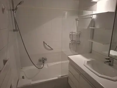 a bathroom with a shower and a tub and a sink at Viva Riviera Studio Croisette Terrace Sea View in Cannes