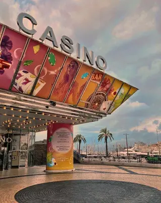 a gas station with a sign on top of it at Appartement moderne et chaleureux à 2 minutes du Palais in Cannes