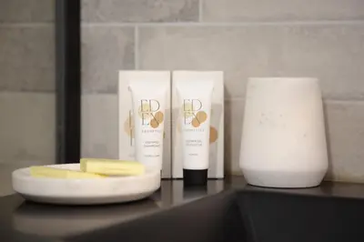 a group of three products sitting on a counter at Sunny Duplex by Connexion in Cannes