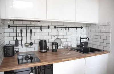a kitchen with a counter top with a sink at Sunny Duplex by Connexion in Cannes