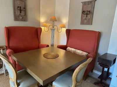 a dining room with a table and two chairs at Congress et Comfort in Cannes