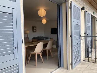 a hallway with a stairway with a door and a door at Townhouse Bellevue in Cannes in Cannes