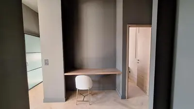 a room with a desk and a chair in a room at first louis marie Beautiful 3 bedrooms elegant and central in Cannes