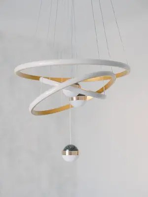 a glass and brass chandelier hanging from a ceiling at Le Corail, Suquet pedestrian area, Cannes in Cannes