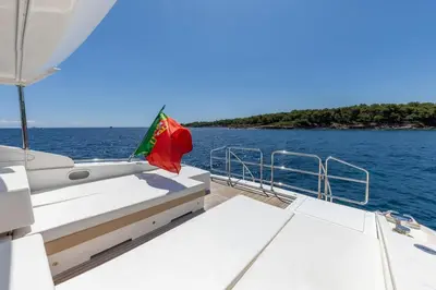 a large living room with a couch and a tv at Yacht Mangusta in Cannes