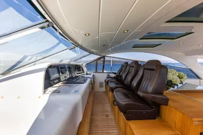 a bedroom with a bed and a tv on the wall at Yacht Mangusta in Cannes