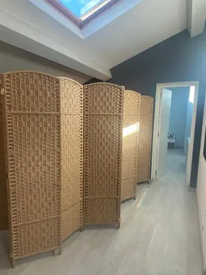 a row of wooden lockers in a room at Cozystay 1825 Luxury Duplex on Rue dAntibes in Cannes