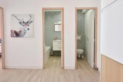 a bathroom with a toilet and a sink at 1-Br with Terrace Carré dOr Walking Distance to the Beaches in Cannes
