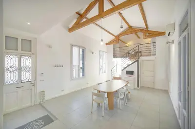 a bathroom with a sink and a mirror at MIPIM Walk-to-Palais 100sqm Loft 2 Ensuite Suites 3 Bathrooms Terrace Business Ready in Cannes