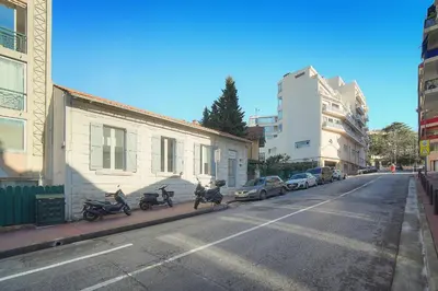 a group of scooters parked on the side of a street at MIPIM Walk-to-Palais 100sqm Loft 2 Ensuite Suites 3 Bathrooms Terrace Business Ready in Cannes