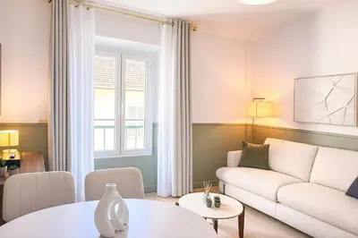 a white bathroom with a sink and a shower at Suite Paloma - Palais & Croisette 1min - 2 chambres - Appartement Hôtel in Cannes