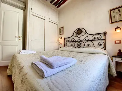 a bedroom with a bed with two towels on it at Saint Antoine Mas1410 in Cannes