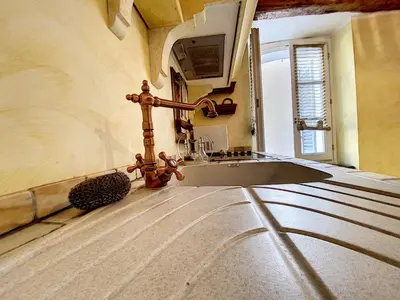 a kitchen with a sink and a faucet at Saint Antoine Mas1410 in Cannes