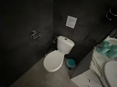 a bathroom with a toilet and a sink at Studio w parking, close to film Festival Palace in Cannes