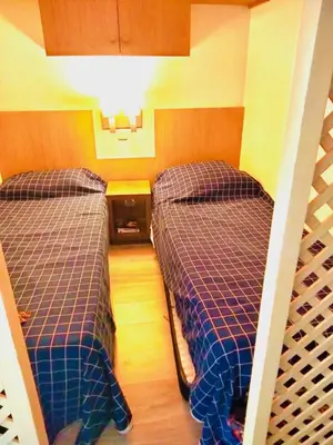 two bunk beds in a room with a staircase at Appartement bord de mer in Cannes