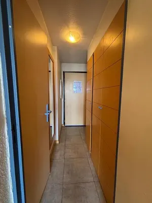 a door leading into a room with a closet at Sea & Sun Verrerie in Cannes