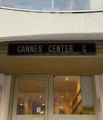 a sign over the door of ansics center at Cannes Center Appartement F9 in Cannes