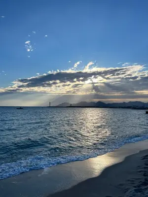 a view of the ocean from the beach at Cannes Center Appartement F9 in Cannes