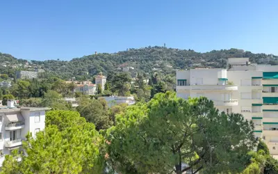 a view of a city with trees and buildings at 303 Le Gallia in Cannes