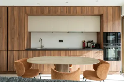 a kitchen with a table and some chairs at Magnifique appartement dans le carré d'or à Cannes in Cannes