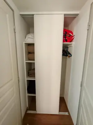 a hallway with a white column in a closet at Quiet Appartment 400m Palais & 100m Beach in Cannes