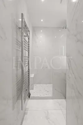 a bathroom with a walk in shower and a shower door at REF 2023- Cannes Croisette - Apartment to rent in Cannes