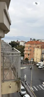 a view of a parking lot with cars on a street at Studio Suquet proche palais des festivals congrès in Cannes