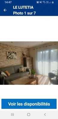 a picture of a living room with a couch at Le lutetia in Cannes