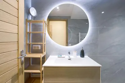 a bathroom with a sink and a mirror at Majopi 2 - Central, AC, close to Palais & beaches in Cannes