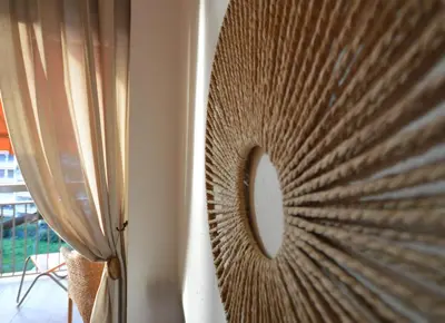 a wall with a largeigunigunigunigunigunigunigunigunigunigunigun at Wiosna- Quiet 1 Bedroom in Cannes